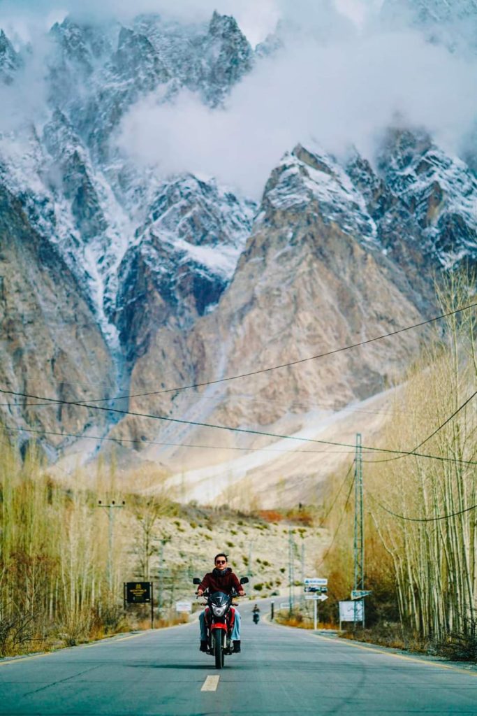 biker tourist enjoy at passu cones